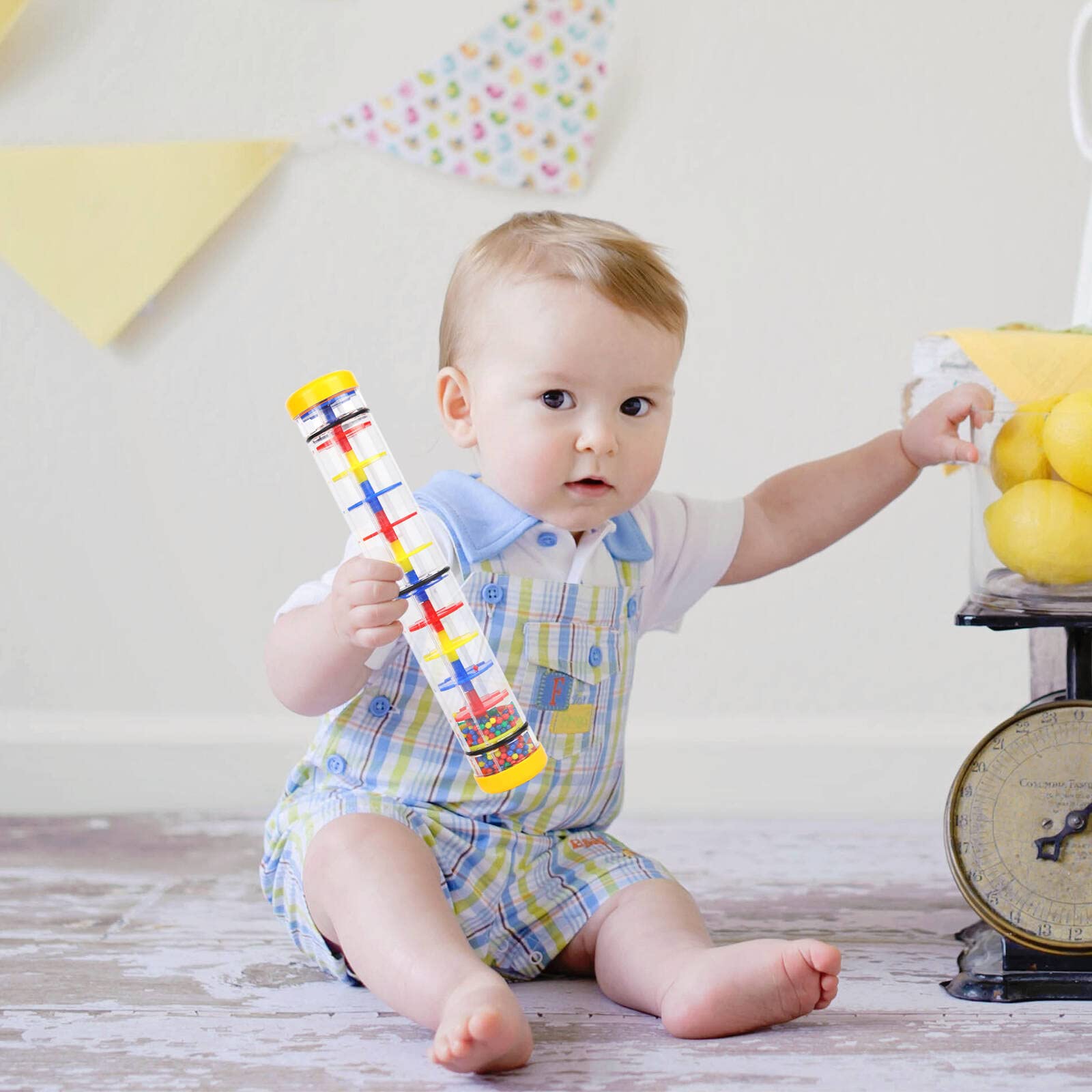 Ubblove Rainmaker supports early color and sound exploration through interactive play.