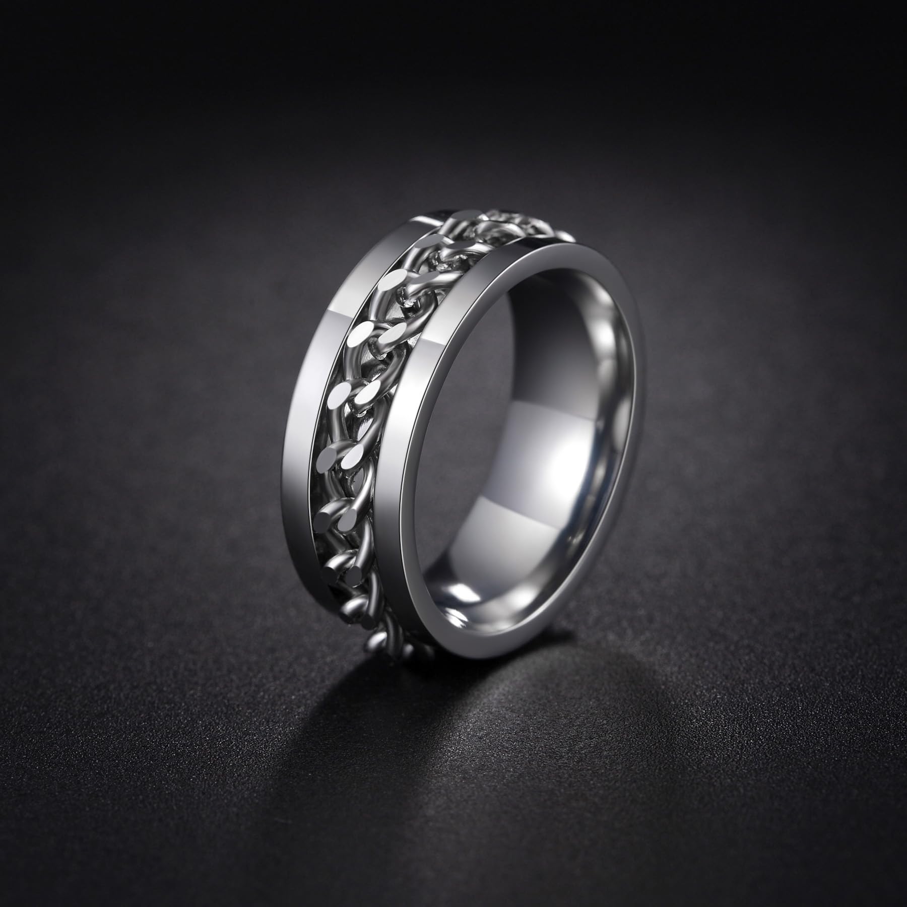 Udolfly fidget ring grooved edge detail and chain spinner.