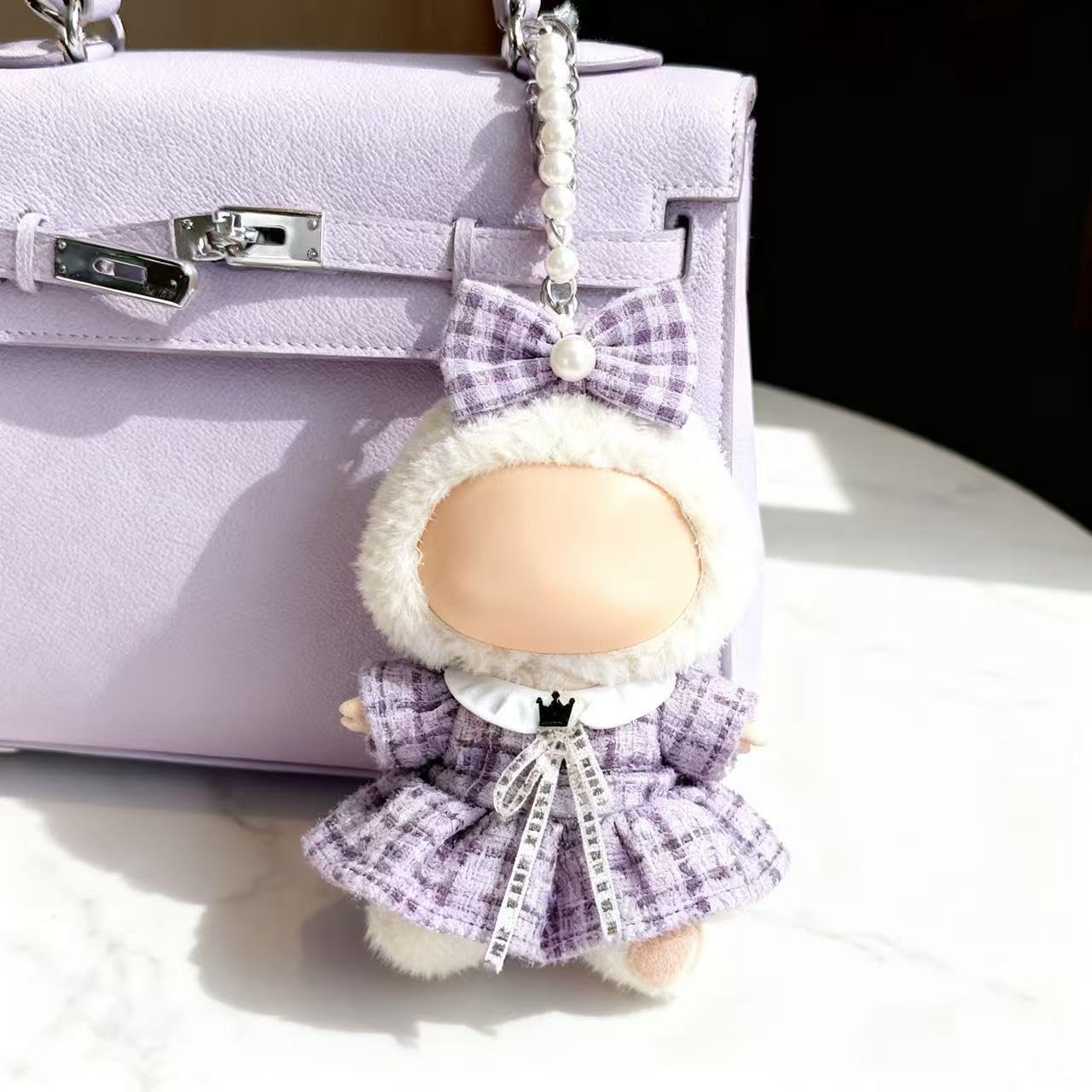 Ueuo doll clothes easy dress-up kit for hassle-free outfit changes.
