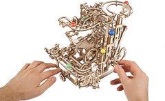 UGEARS advanced model assembly pieces show the kit's precision components.