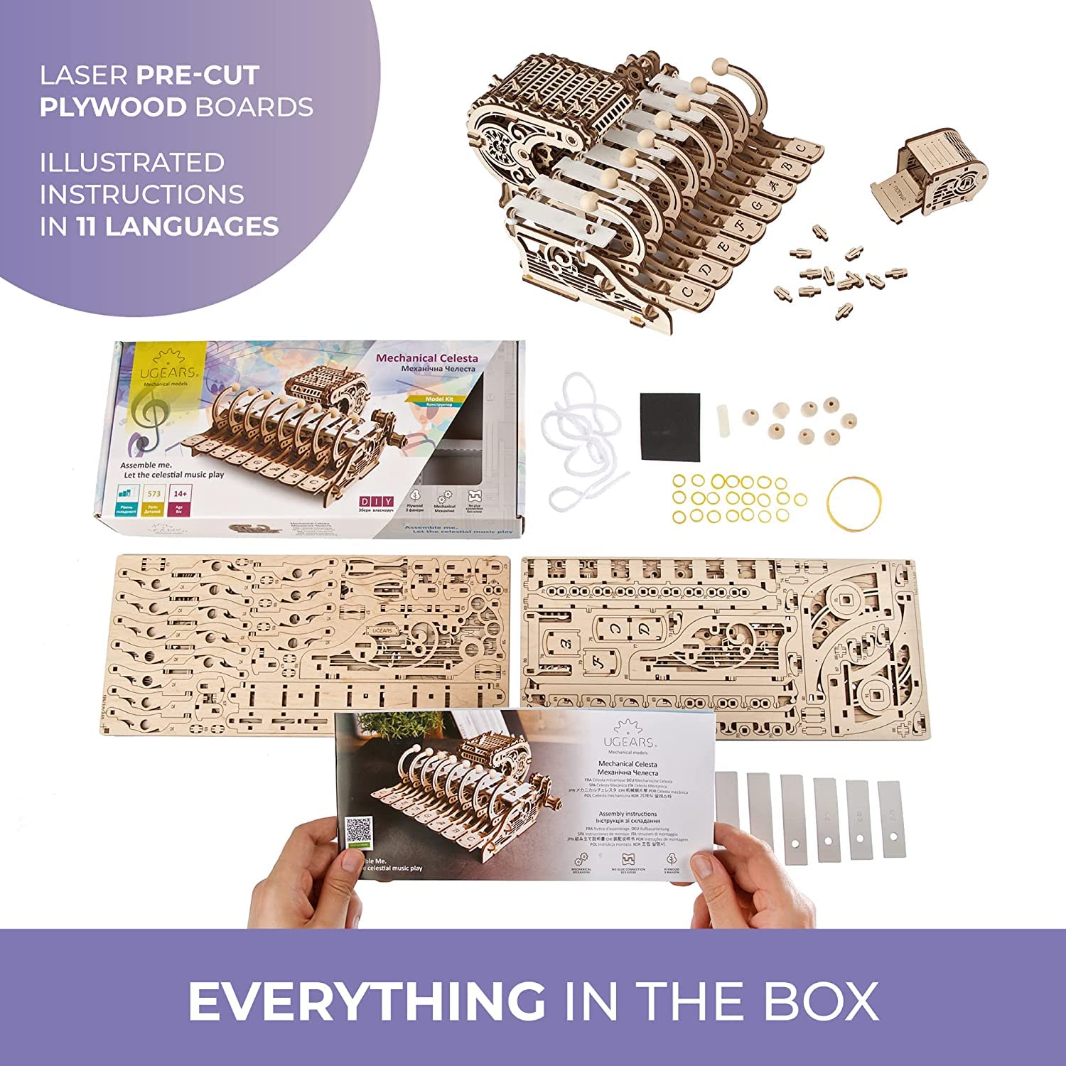 UGEARS Celesta laser-cut pieces spread on a worktable; 573 pieces for immersive building