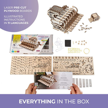 UGEARS Celesta laser-cut pieces spread on a worktable; 573 pieces for immersive building