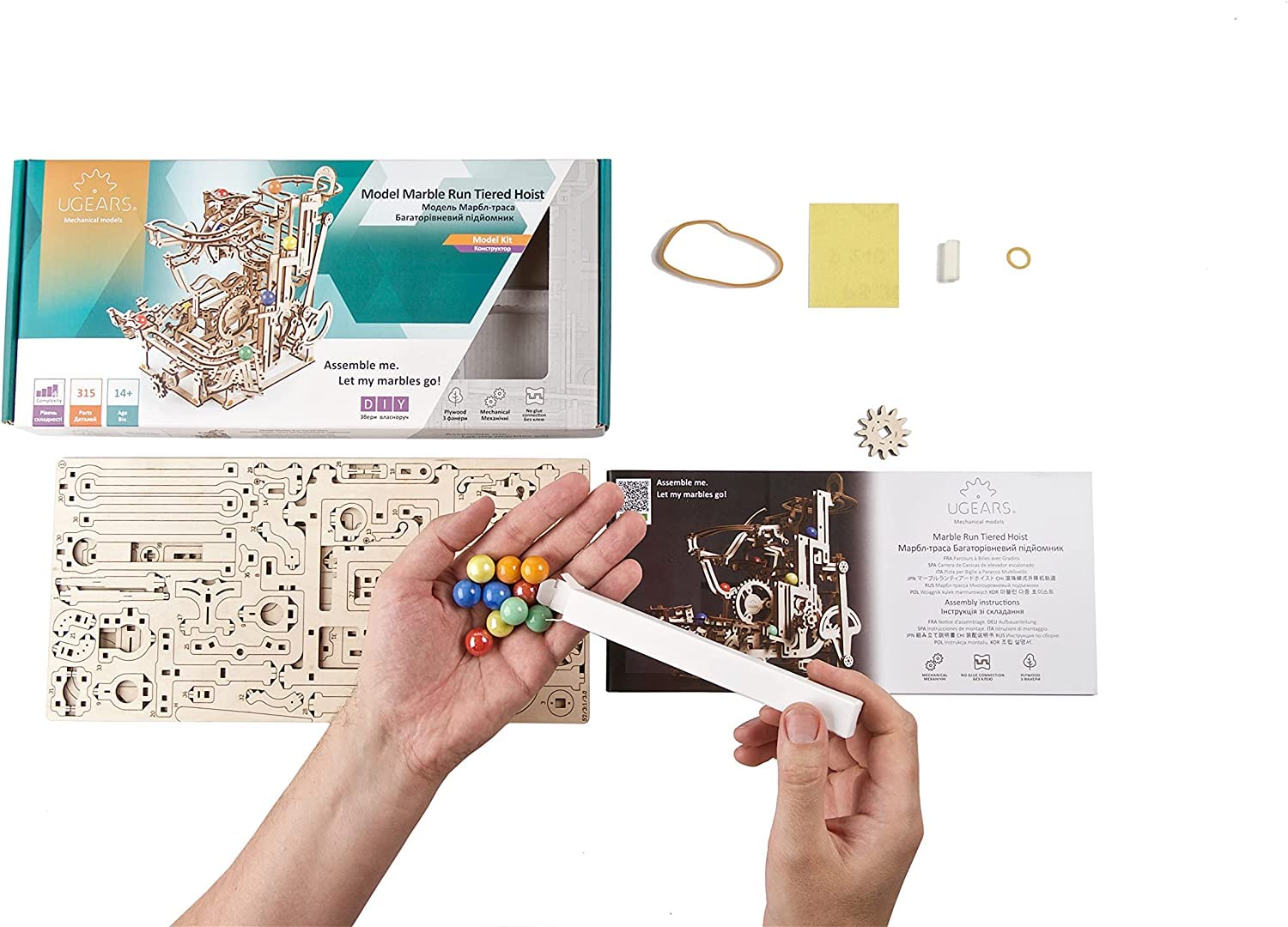 UGEARS puzzle in action reveals a complete marble run experience.
