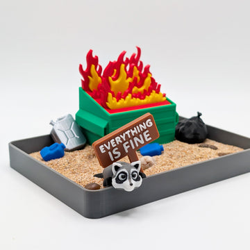 UglaForge Dumpster Fire Zen Garden setup highlights calming textures for mindful desk decor.