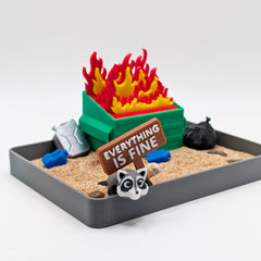 UglaForge Dumpster Fire Zen Garden setup highlights calming textures for mindful desk decor.