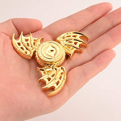 Umnodobn Dragon fidget spinner decorative display piece on desk.