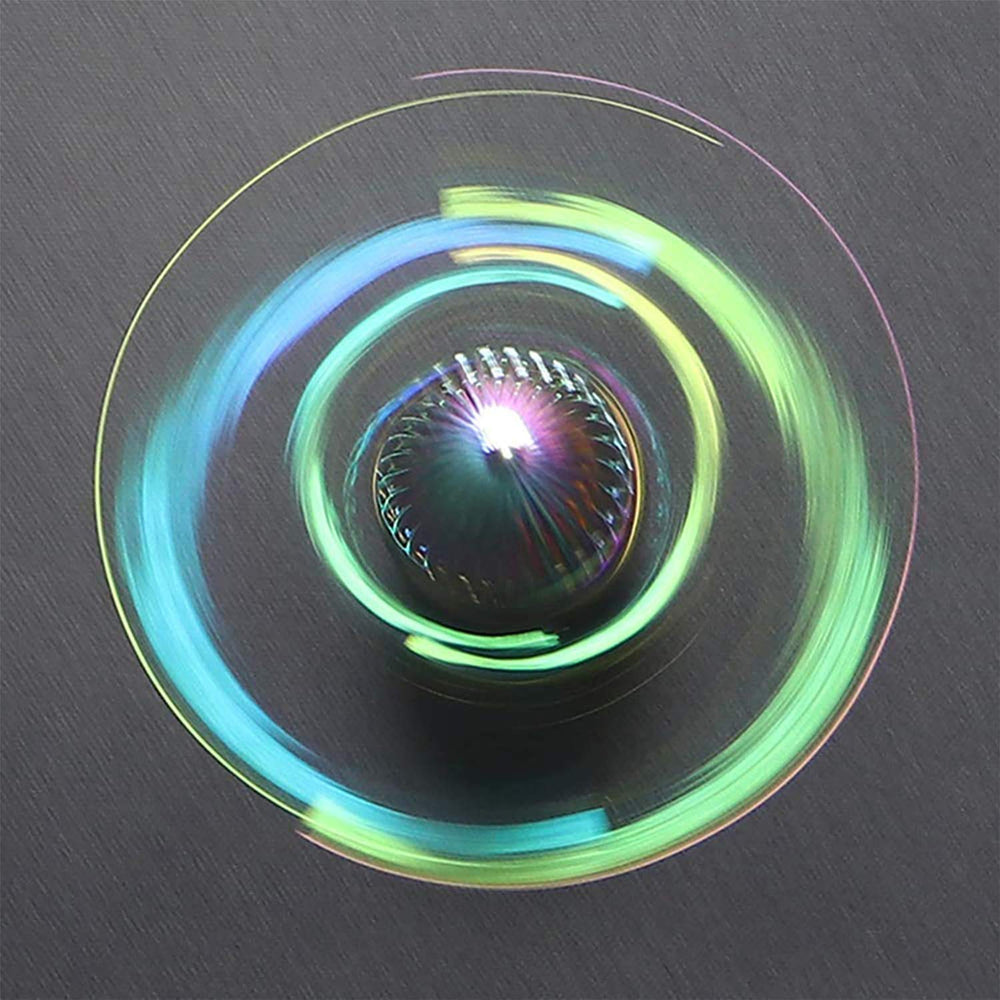 Umnodobn Rainbow Orb Spinner side view highlighting compact portable design