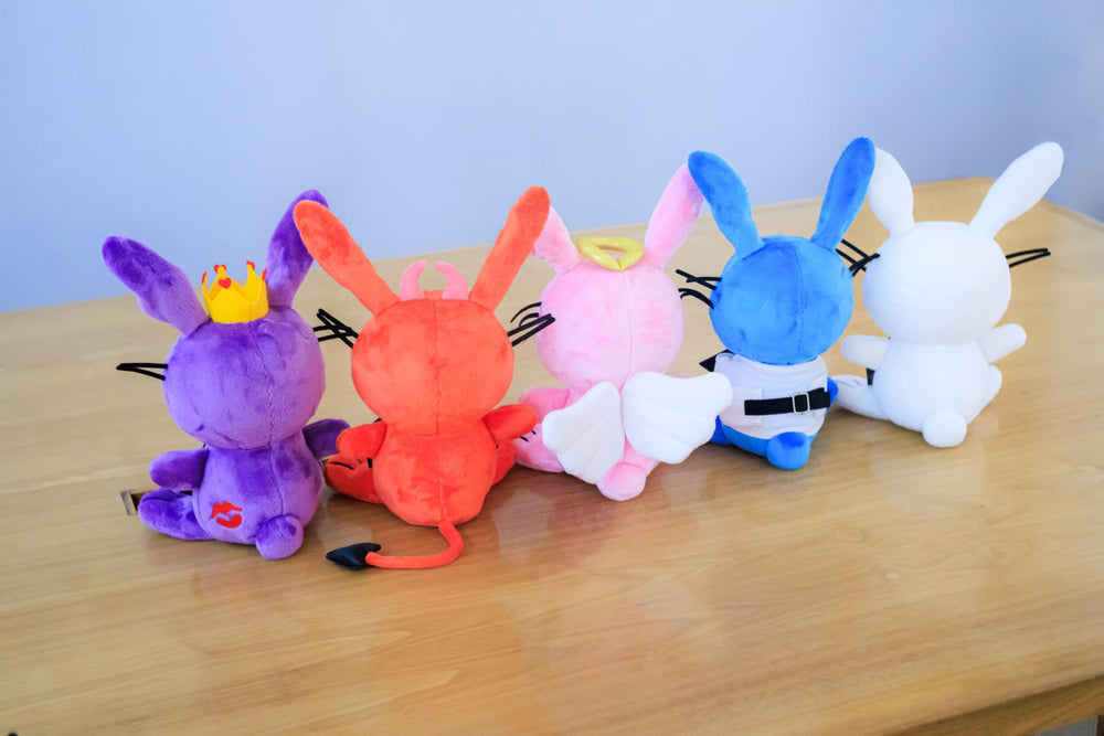 UNCUTE It's Happy Bunny Plush Angel makes a charming desk buddy for your space.
