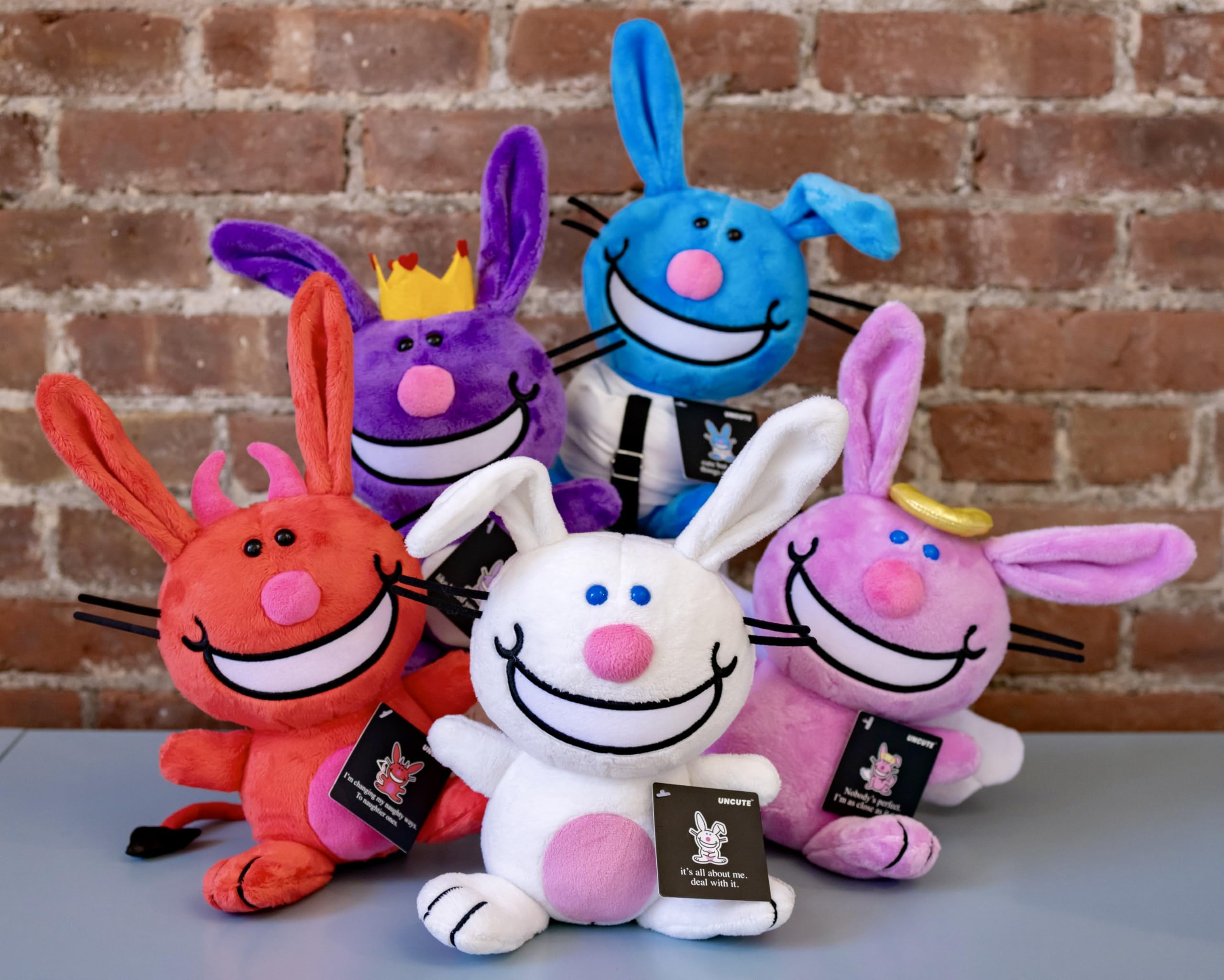 UNCUTE It's Happy Bunny Plush Angel features a detailed face for characterful appeal.