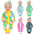 UNICORN ELEMENT leaf-pattern jumpsuit on a doll, soft fabric and bright colors.