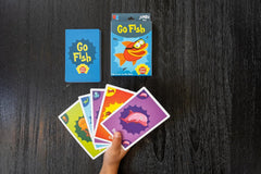 Kids playing Go Fish with University Games cards builds turn-taking and interaction.