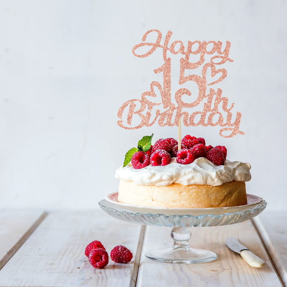 Unoggsor rose gold glitter topper on cake enhances party decor.