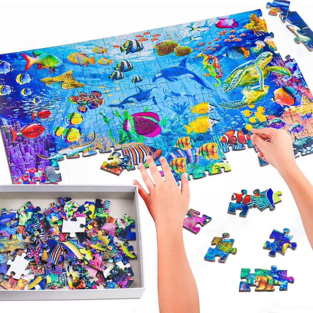 Kids exploring ocean scene puzzle, promoting learning and concentration.