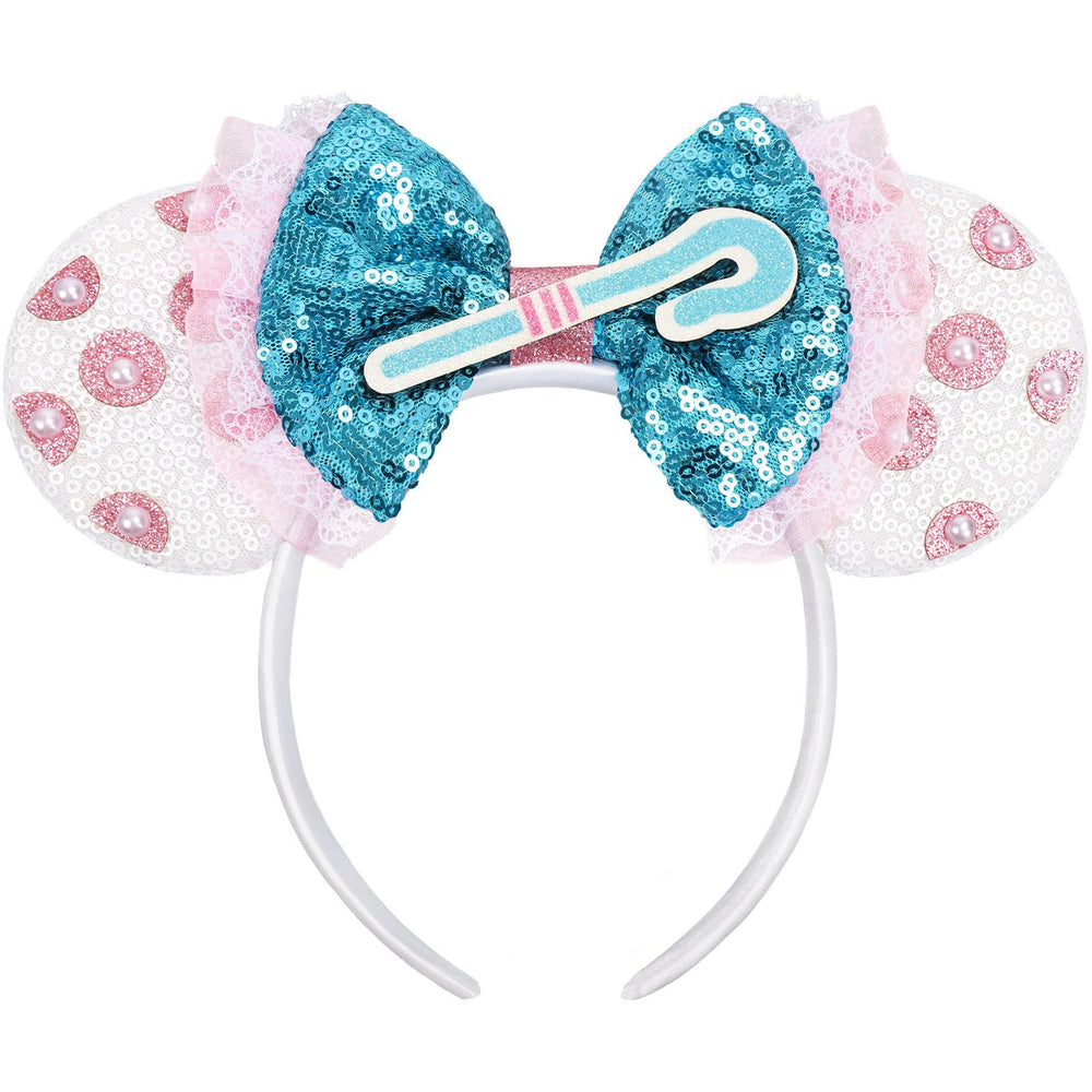 UNSPAZ mouse ears headband in pink polka dots for a playful park look.