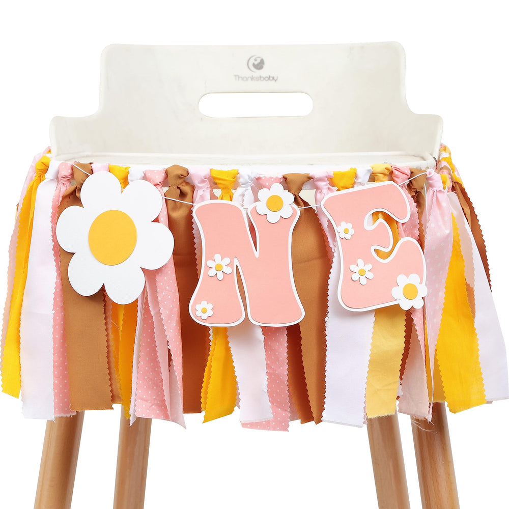 UOAOU Groovy One banner for highchair adds festive flair to a first birthday.