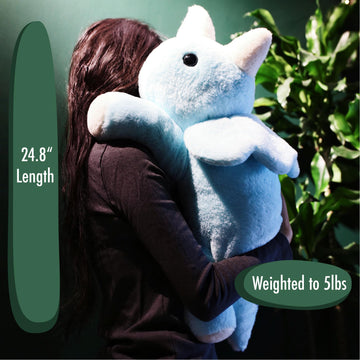 uoozii blue dinosaur weighted plush shown in a cozy nightly cuddle scene.