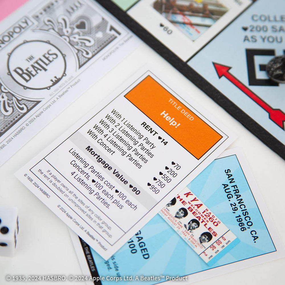 USAOPOLY Beatles Money, custom currency for themed transactions.