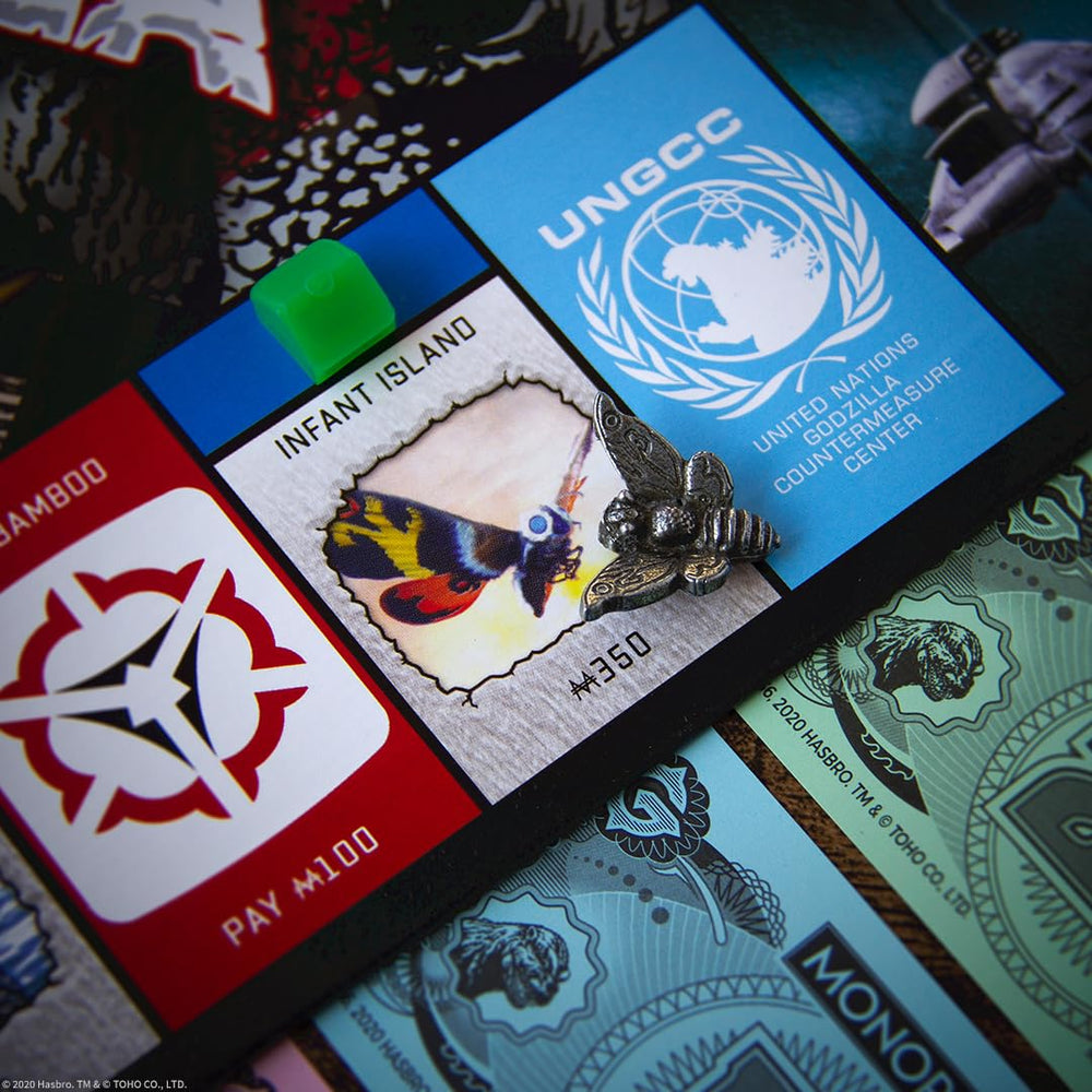 USAOPOLY Kaiju tokens collection on display during play.
