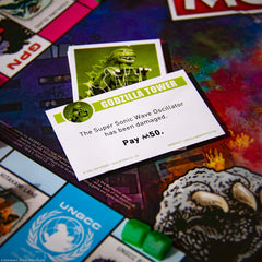 USAOPOLY Godzilla board Kitakami Lake location fuels player strategy.