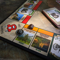 USAopoly Monopoly National Parks board close-up displaying park routes and colorful spaces for exploration.