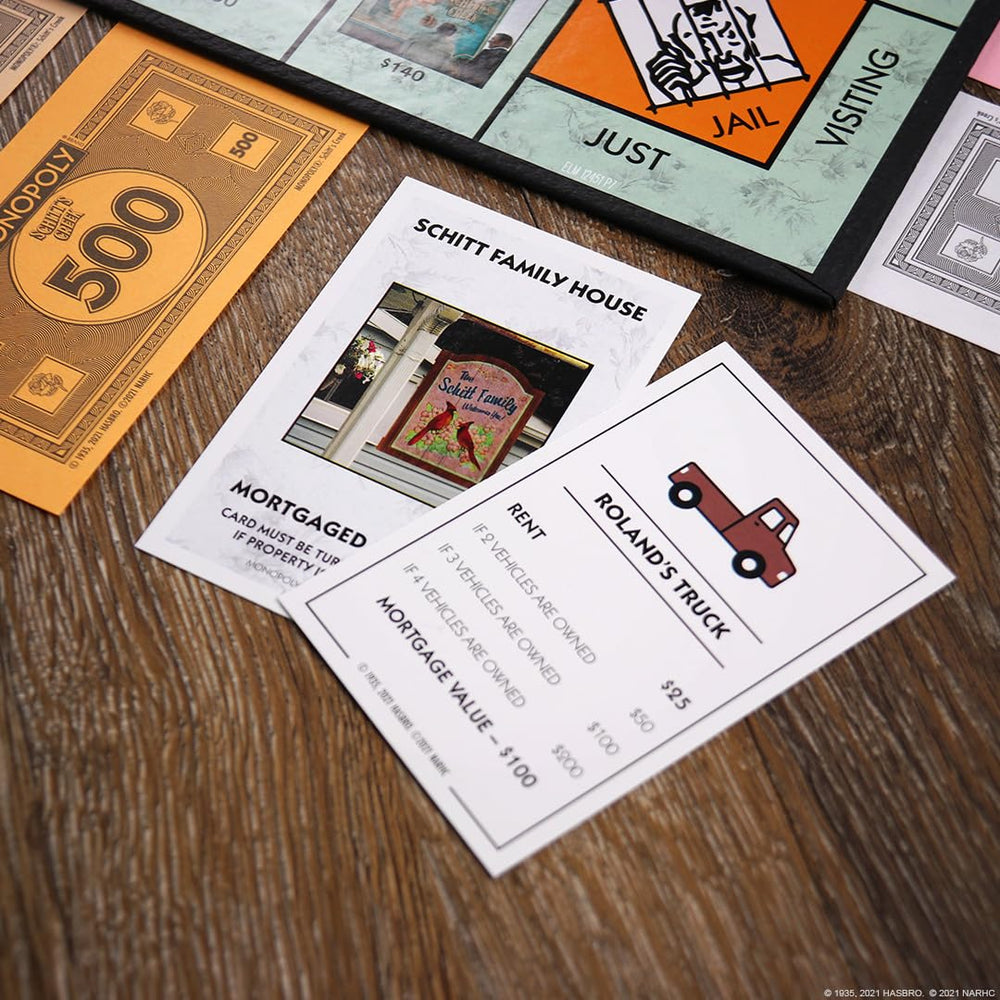 USAOPOLY token Davids Sunglasses adds witty moments to turns.