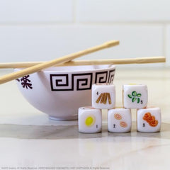 USAOPOLY Naruto Shippuden Yahtzee dice set for quick, flavorful play sessions.