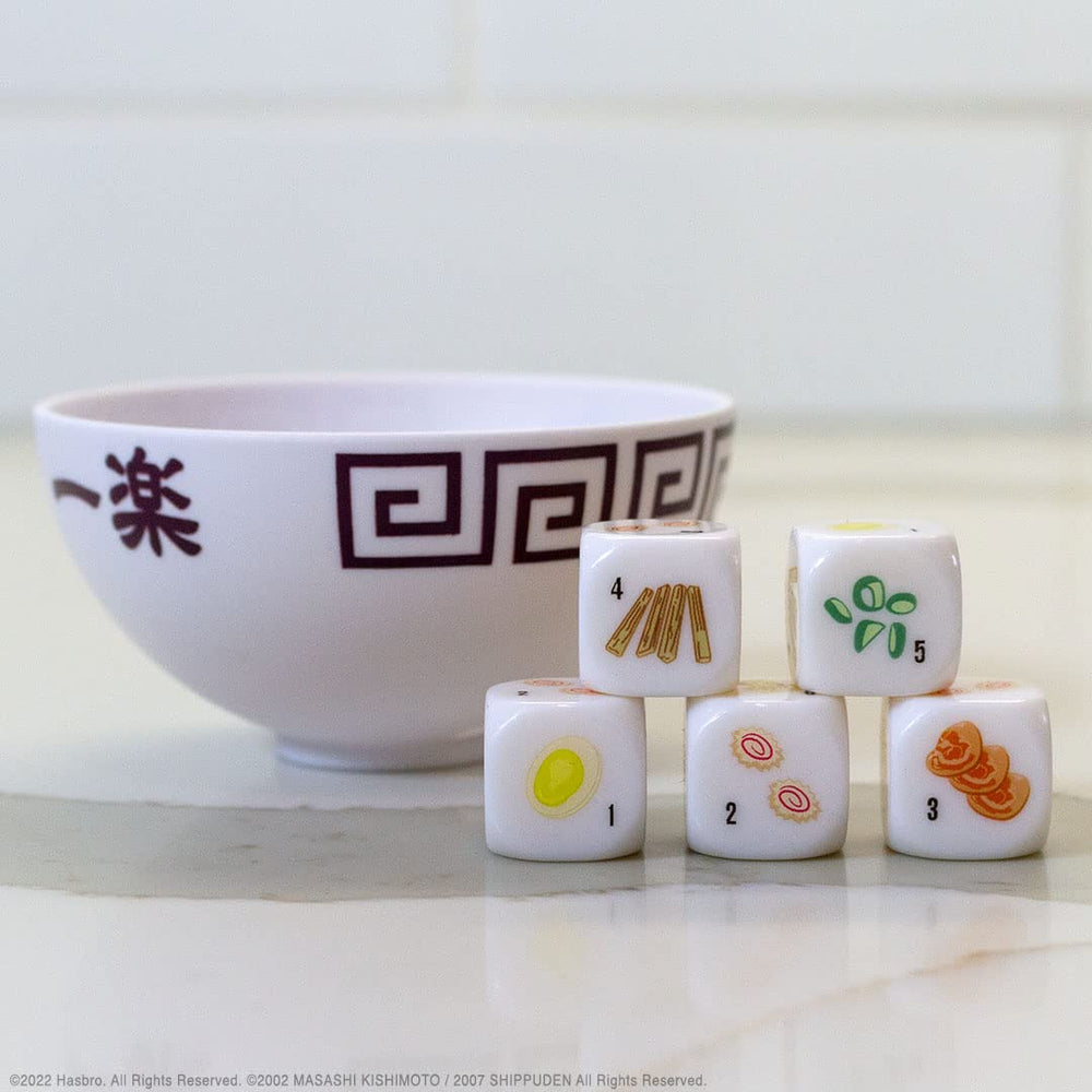 USAOPOLY Naruto Shippuden Yahtzee packaging showcases travel-friendly set.