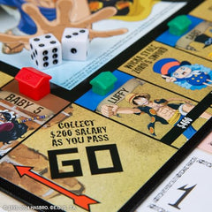 USAOPOLY One Piece Edition Luffy token close-up in action.