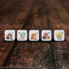 USAOPOLY Yahtzee dice faces showcase Sanji and Usopp for exciting rounds.
