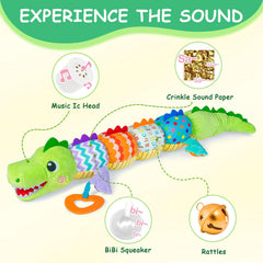 Ussybaby caterpillar crocodile toy rattle section invites grasping and auditory curiosity.