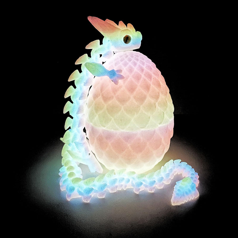 UXBSTM dragon egg inside dragon, a collectible display with tactile fascination.