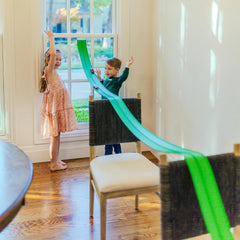 Valchemist FlexTrack 5000 bendable track laid on a table for creative racing.