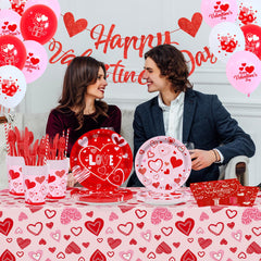 Valentine's Day party supplies napkins in vibrant red complement plates and create a cohesive look.
