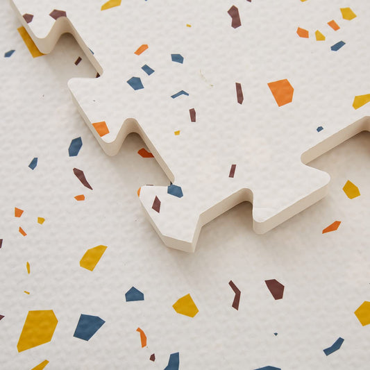 Valioza Terrazzo Playmat with interlocking tiles for quick setup and safe play space.
