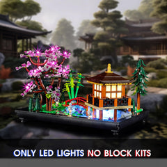 Vaodest arch bridge koi-pond lighting highlights serene garden features.