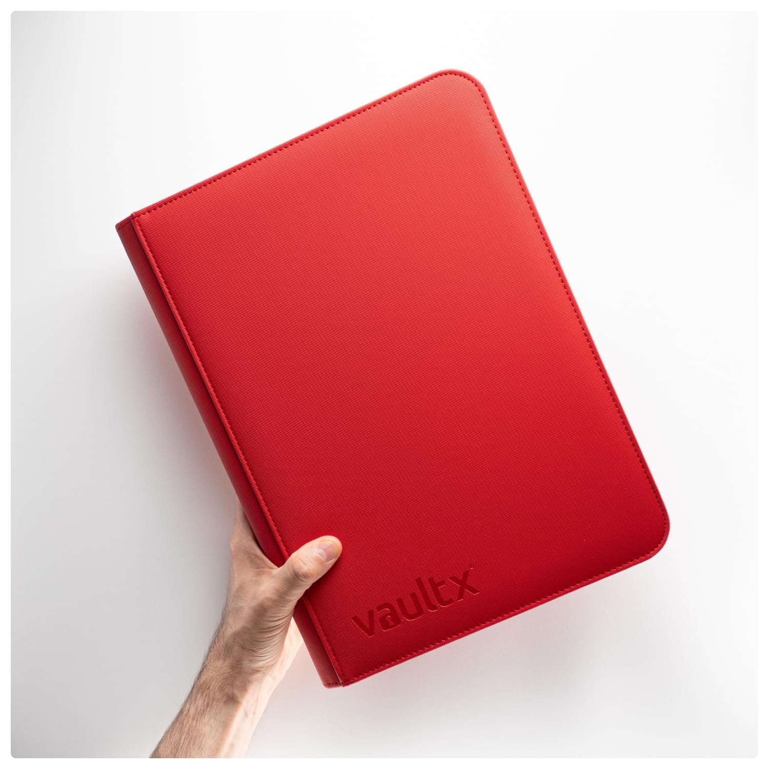 Compact 26x35 cm binder fits standard card sleeves.