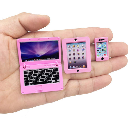 Vawuz pink laptop in closed position for 1:12 scale dollhouse displays.