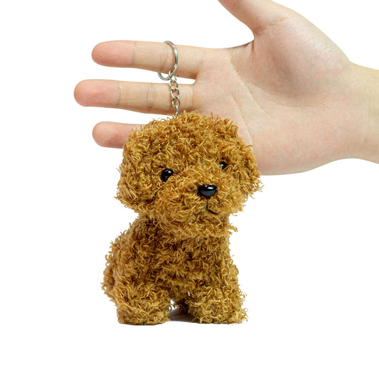 Vel dog anime plush keychain attached to a backpack clip for easy access.