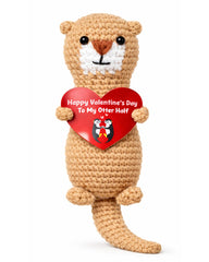 VELENTI crochet otter holding heart, a romantic keepsake for couples.