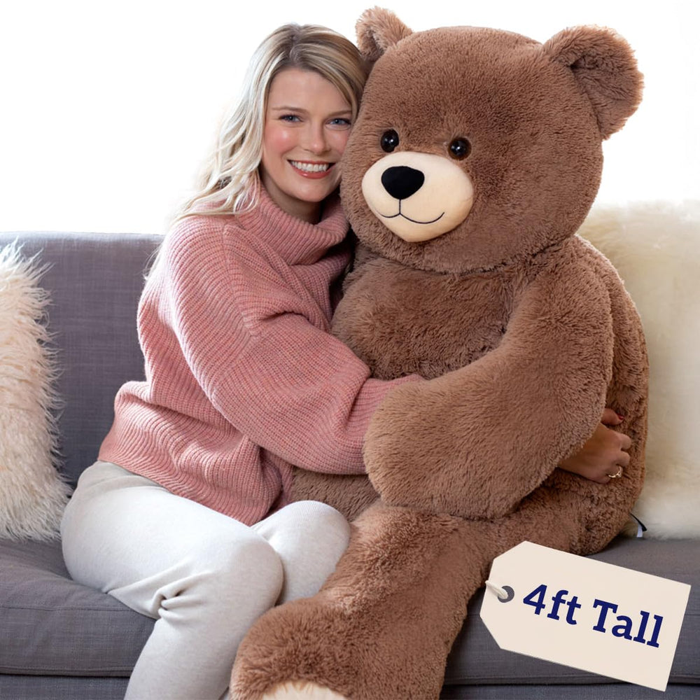 Vermont Teddy Bear giant 4ft teddy bear, bold room presence for cozy hugs.