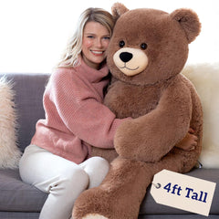 Vermont Teddy Bear giant 4ft teddy bear, bold room presence for cozy hugs.