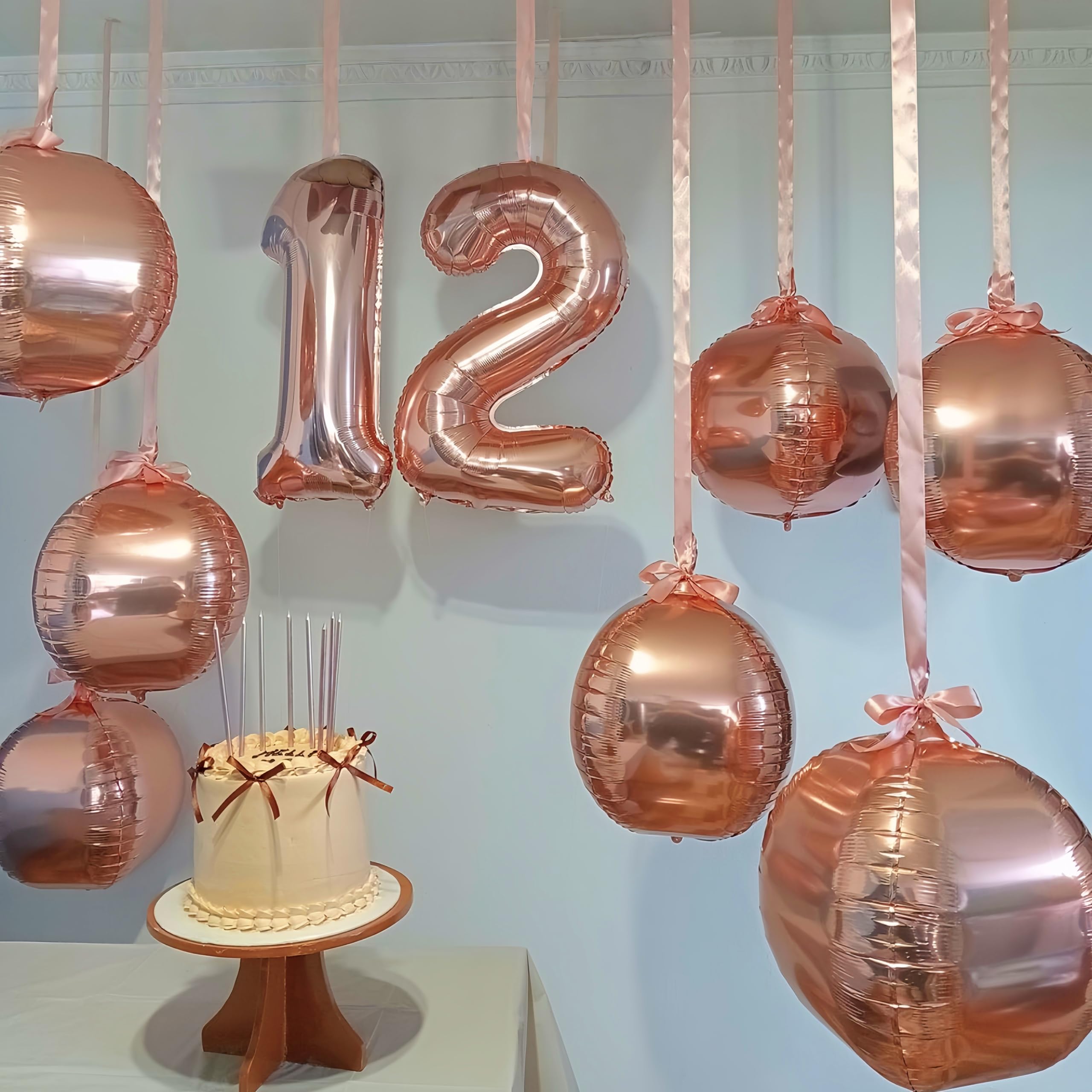 Vibzox rose gold 10-inch foil balloons create charming party accents.