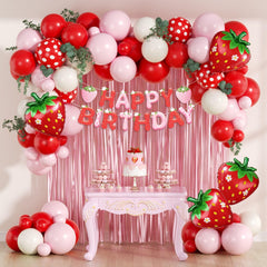 Vicduotex strawberry pink fringe curtain creates a whimsical photo backdrop.