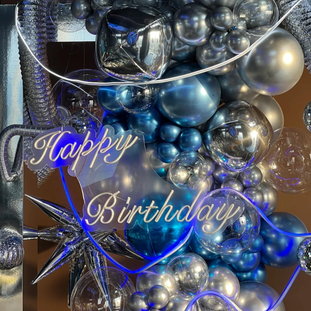 Voircoloria adhesive dots and ribbons help secure balloon displays.