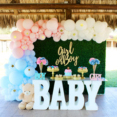 Voircoloria baby shower decor in light blue enhances theme cohesion.