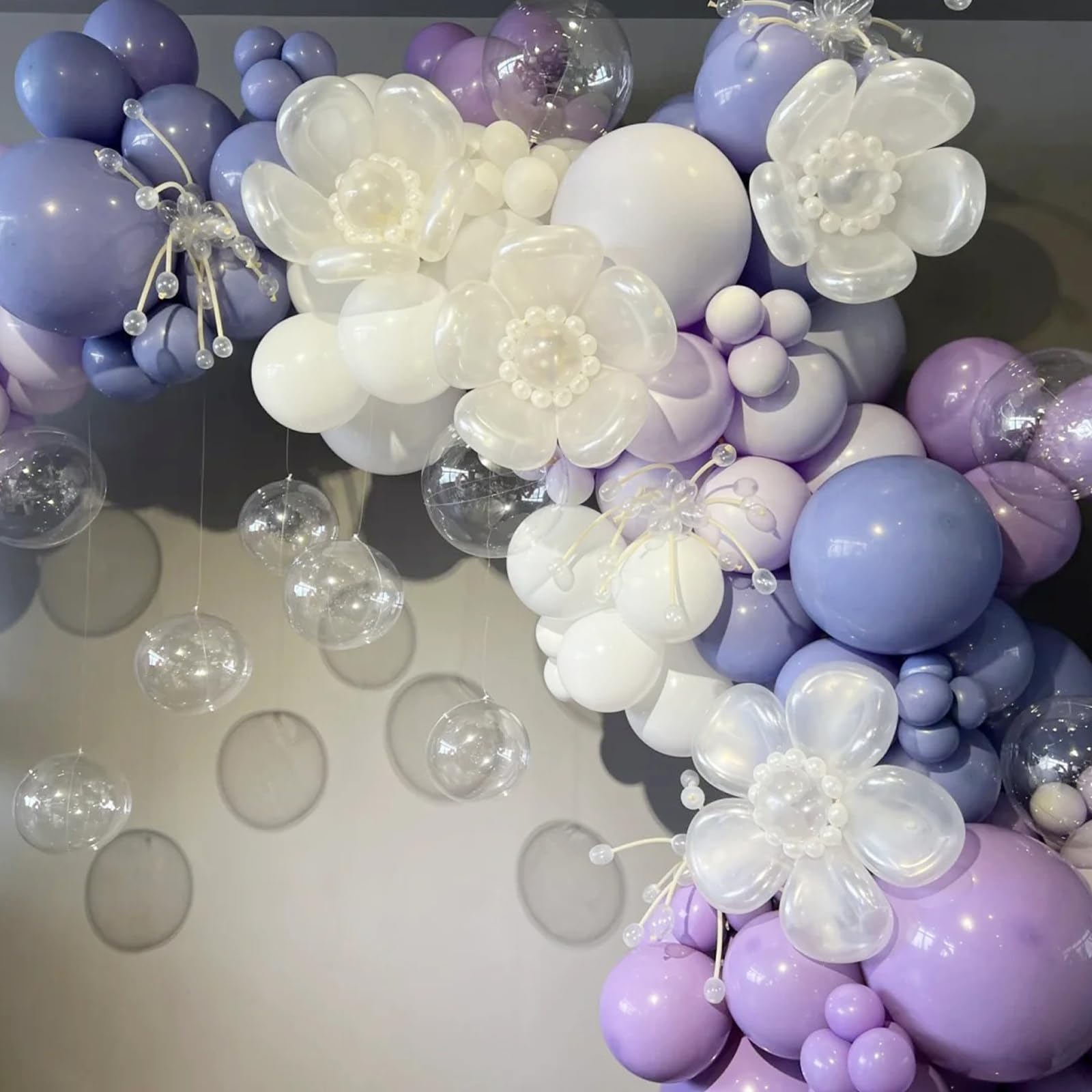 Voircoloria pastel purple balloons in 10-inch size add depth to arches and garlands.
