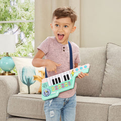 Child plays with Bluey keytar exploring melodies and sounds