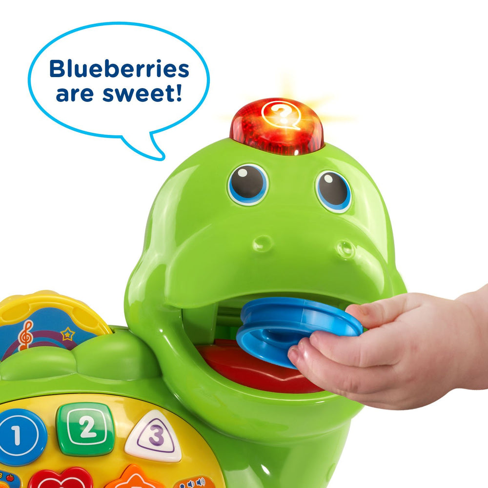 VTech Chomp and Count Dino shows colorful pieces for color recognition