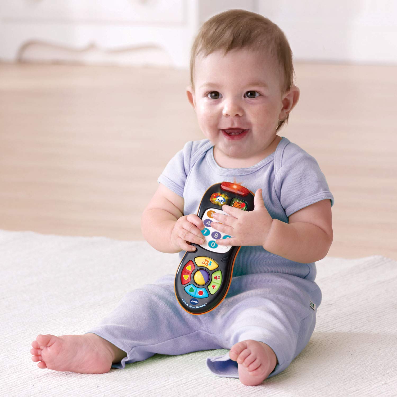 VTech Click and Count Remote illustrates channel surfing with nine pretend channels for role-play