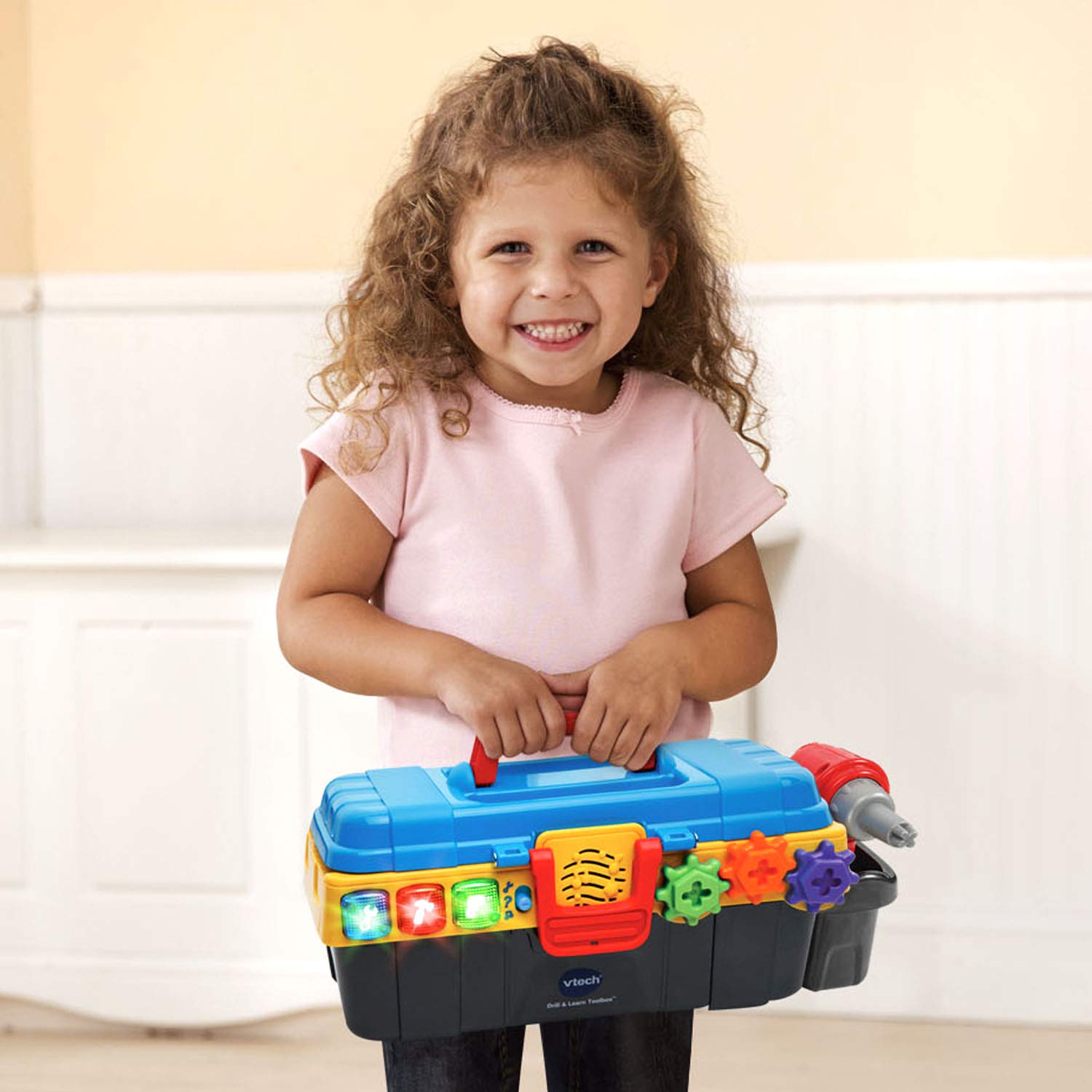 VTech Drill and Learn Toolbox screws to complete pretend repairs